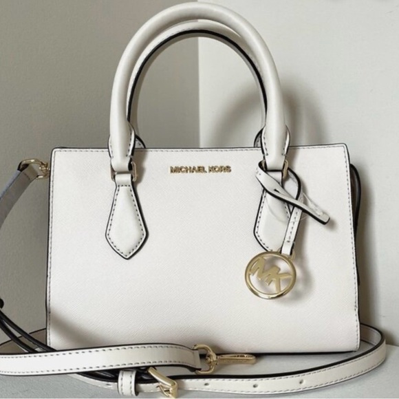 Michael Kors Handbags - Michael Kors Sheila Small Satchel Handbag in Cream